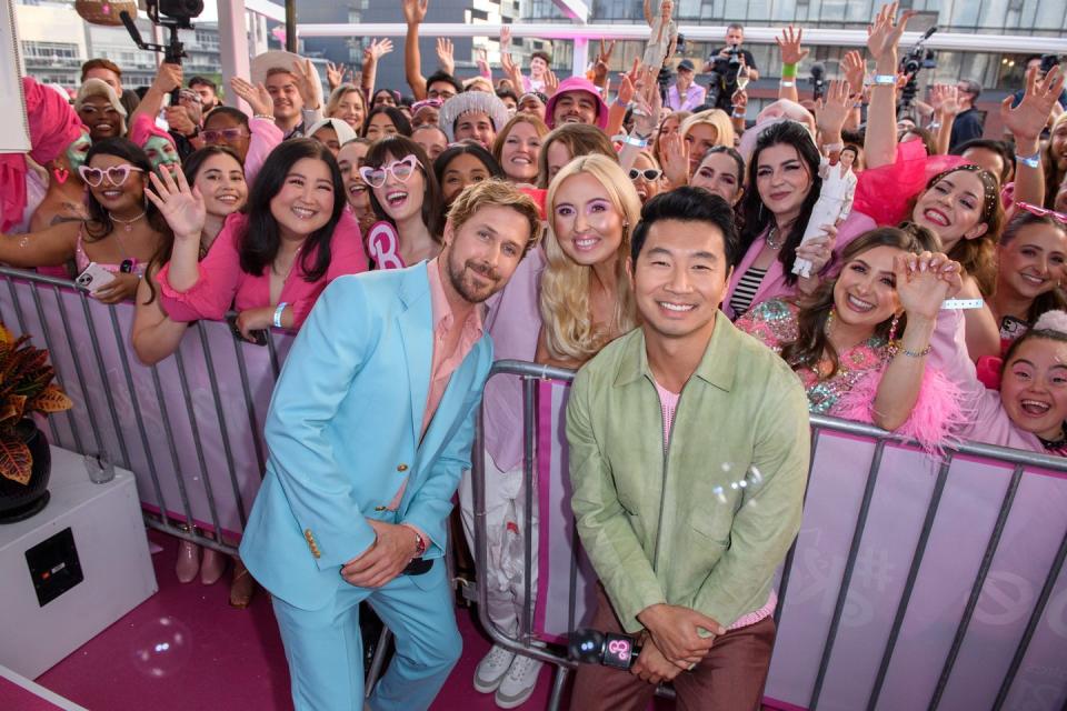 ryan gosling and simu liu doing barbie press