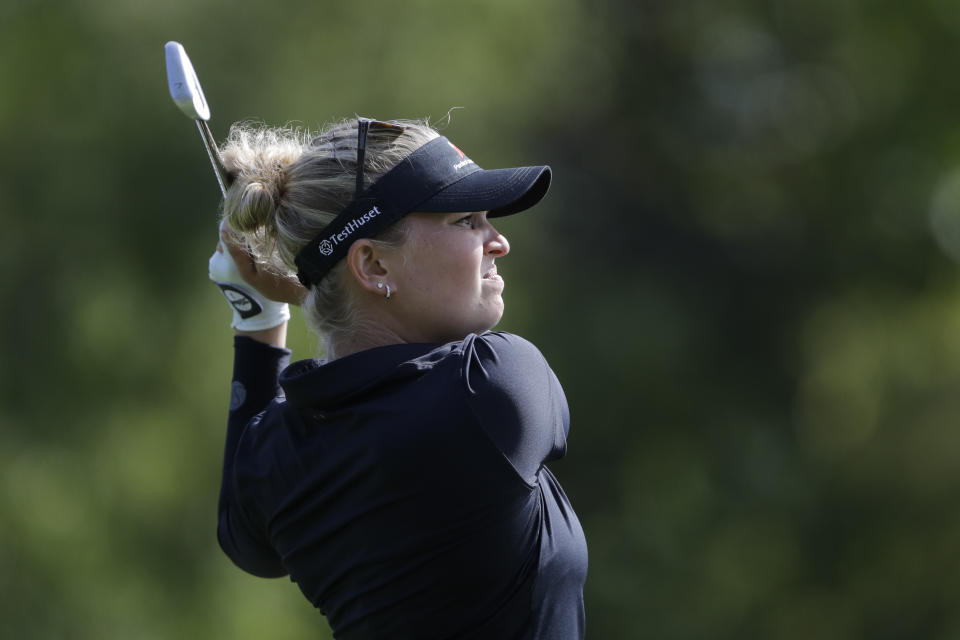 Nanna Koerstz Madsen, of Denmark, watches her tee shot on the seventh hole during the first round of the Indy Women in Tech Championship golf tournament, Thursday, Sept. 26, 2019, in Indianapolis. (AP Photo/Darron Cummings)