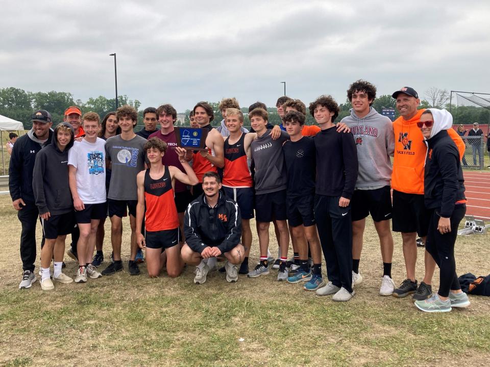 Middletown North boys track with the Central Group 3 trophy