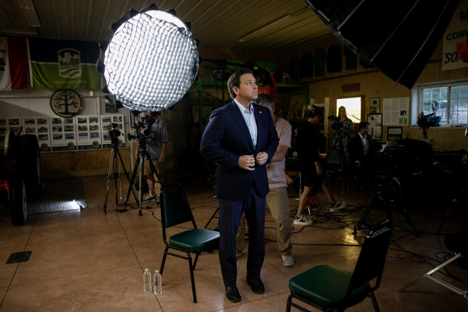 Image: Florida Gov. Ron DeSantis before an interview with NBC News correspondent Dasha Burns in Cedar Rapids, Iowa, on Sunday. (Maddie McGarvey for NBC News)