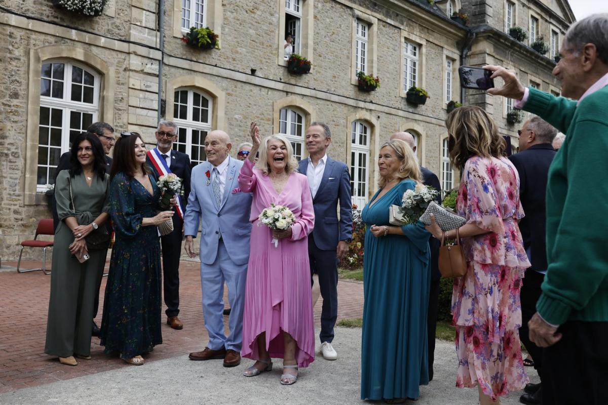 A World War II veteran has just married his bride near the D-Day beaches of Normandy. He is 100, she is 96