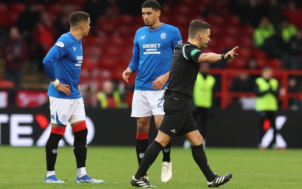 Referee Nick Walsh awards Rangers a VAR penalty during the Cinch Scottish Premiership match between Aberdeen and Rangers FC at Pittodrie Stadium on November 26, 202