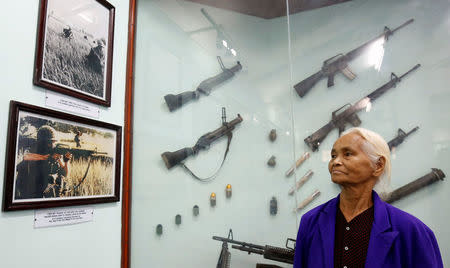 Pham Thi Thuan, My Lai massacre survivor, stands in a museum during the 50th anniversary of the My Lai massacre in My Lai village, Vietnam March 15, 2018. REUTERS/Kham