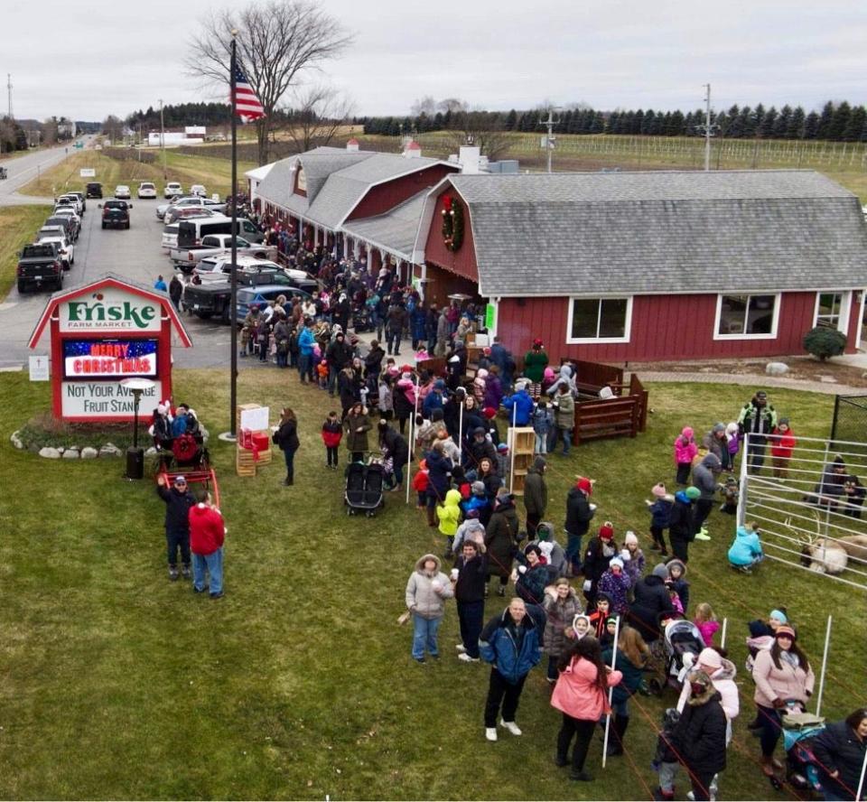 People lined up at the Country Christmas event Saturday at Friske Farm Market in Antrim County in northern Michigan.