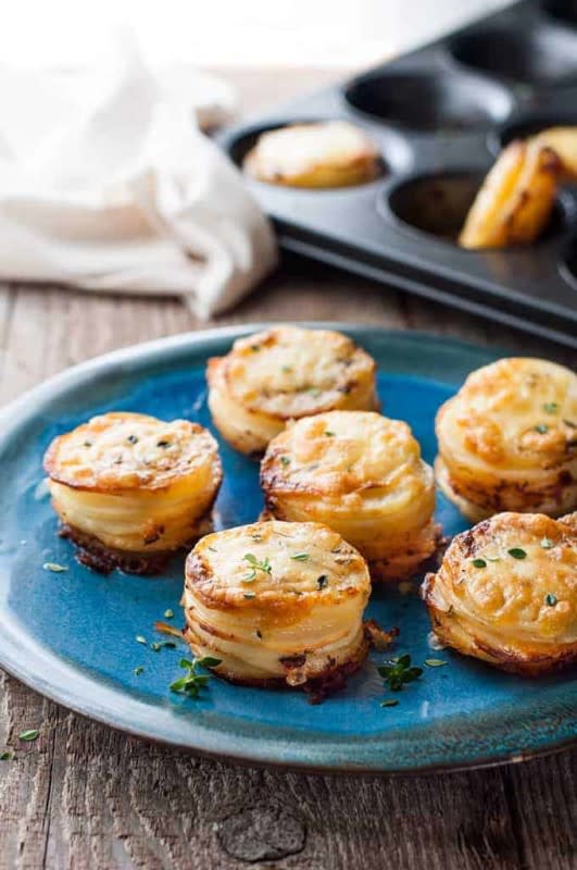 <p>RecipeTin Eats</p><p>These mini potato gratin stacks are cheesy, creamy and ridiculously irresistible.</p><p><strong>Get the recipe: </strong><a href="https://www.recipetineats.com/cheesy-potato-gratin-stacks-muffin-tin/" rel="nofollow noopener" target="_blank" data-ylk="slk:Cheesy Potato Gratin Stacks;elm:context_link;itc:0;sec:content-canvas" class="link "><strong>Cheesy Potato Gratin Stacks</strong></a></p>