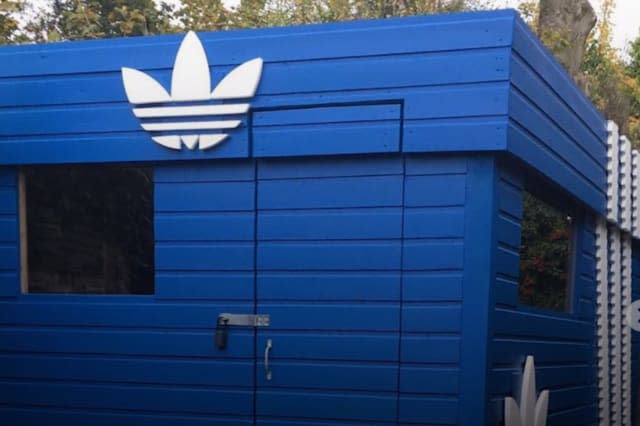 Man builds Adidas inspired shed in back garden