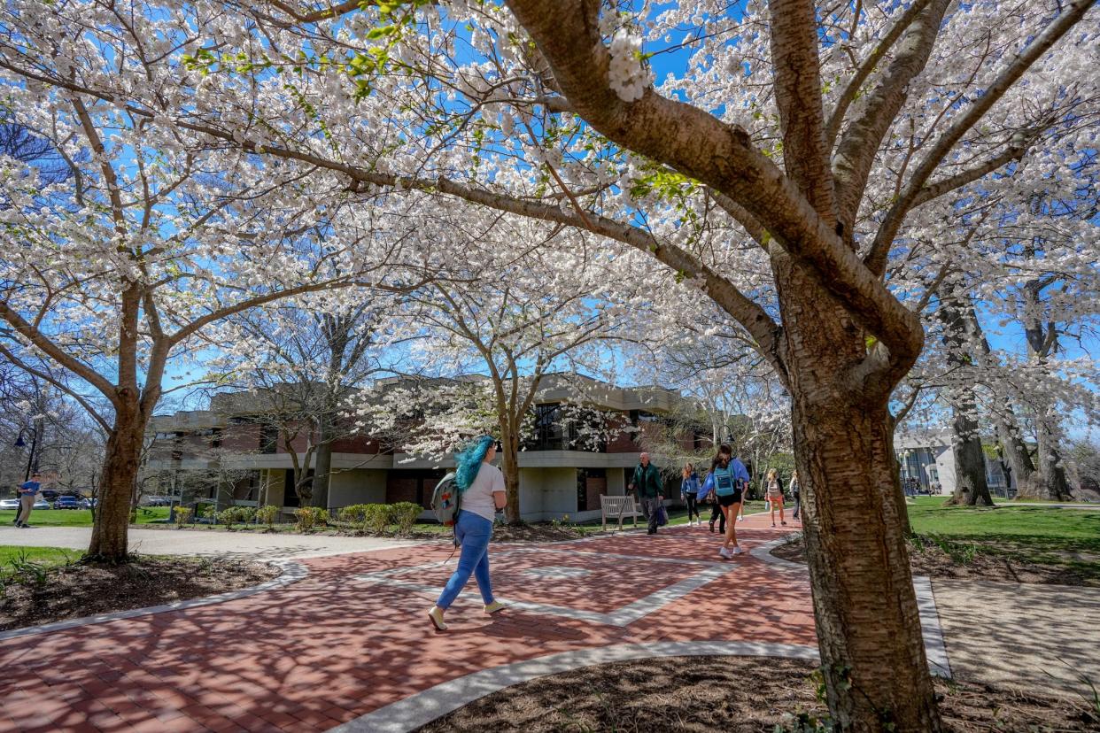 Students walk to class on the Providence College campus, where tensions have flared over issues relating to the LGBTQ+ community.