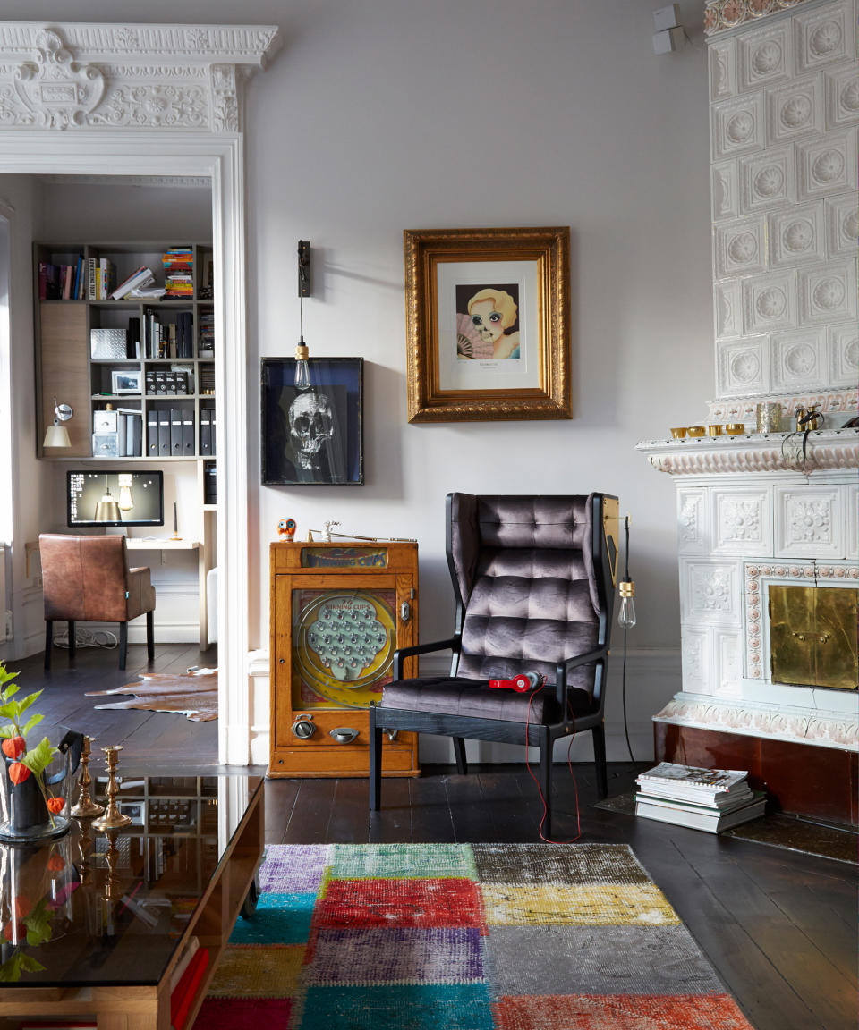 <p> Here, retro and mid-century modern influences dominate a masculine space. Take for instance the seventies-style patchwork rug, vintage arcade game and velvet chesterfield-style black armchair with over-the-head headphones &#x2013; a gamer&apos;s delight. </p> <p> With a clear love for skull artwork, this miniature Gothic gallery wall idea is brightened up by a Buster &amp; Punch Hooked Wall Light made from graphite powder-coated metal for an industrial edge. </p> <p> And, if you look closer, you&apos;ll notice a perfectly poised cream wall light fixed above the computer screen in this tech enthusiast&apos;s home. </p>