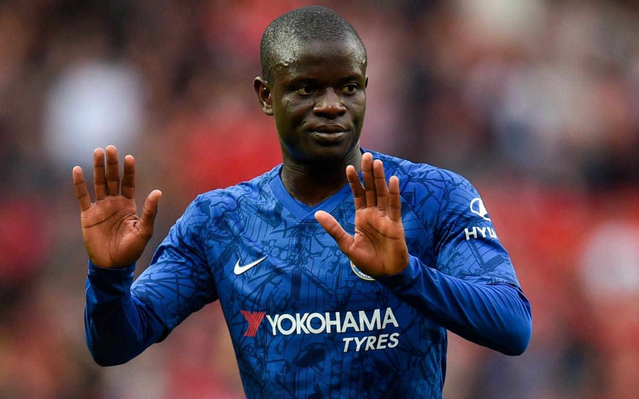 Chelsea's French midfielder N'Golo Kante reacts on the pitch at the final whistle in the English Premier League football match between Manchester United and Chelsea at Old Trafford in Manchester, north west England - Getty Images