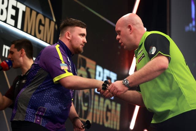 Luke Littler (left) after victory against Michael Van Gerwen