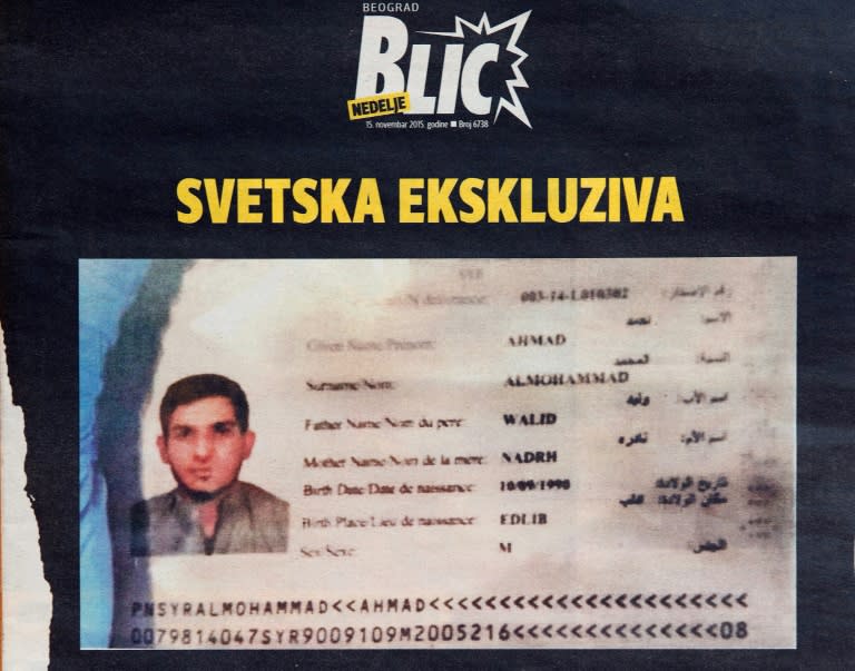 A photo taken in Belgrade on November 15, 2015 shows the front page of Serbian magazine Blic, displaying a Syrian passport issued to asylum seeker Ahmad alMohammad and found by police at the scene of one of the Paris attacks