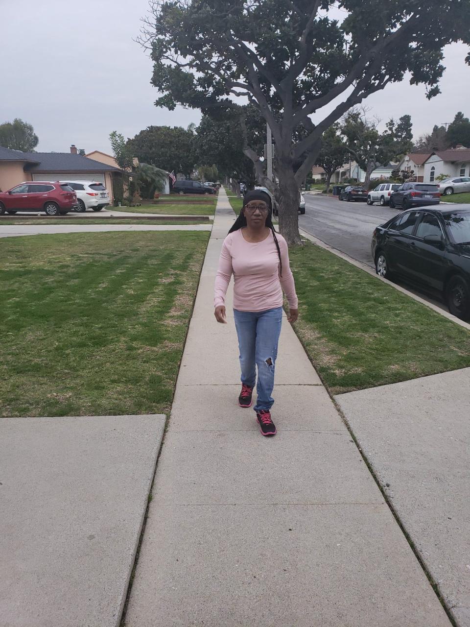 Saunta Anderson, who is on eight drugs for conditions including rheumatoid arthritis and diabetes, is shown walking near her home In Los Angeles.
