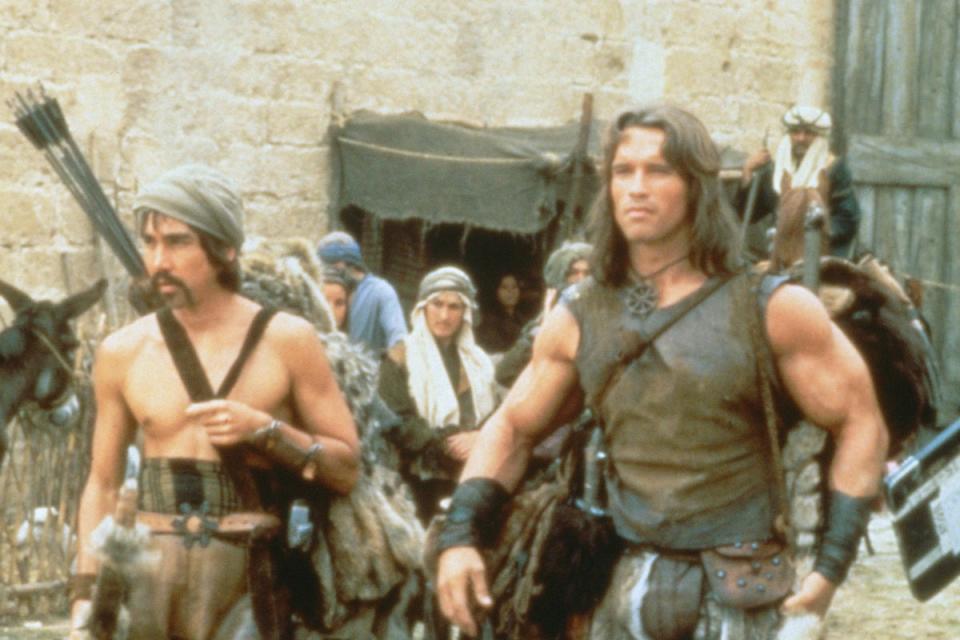 Arnold Schwarzenegger (right) as Conan the Barbarian (Twentieth Century Fox)