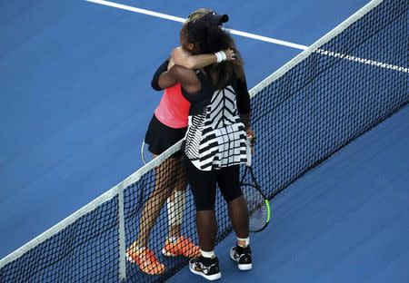 Tennis - Australian Open - Melbourne Park, Melbourne, Australia - 26/1/17 Serena Williams of the U.S. consoles Croatia's Mirjana Lucic-Baroni after winning her Women's singles semi-final match. REUTERS/Jason Reed