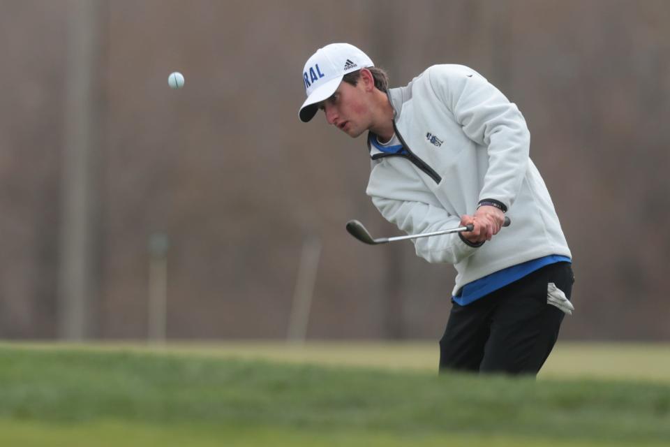 Washburn Rural's Luke Leonetti chips from the rough on hole 18 at Wamego Country Club on April 7.