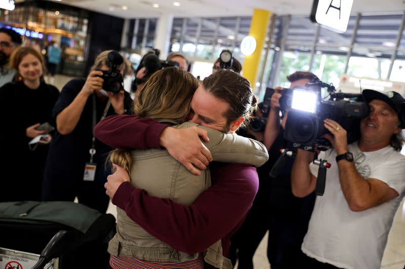 Passengers arrive from New Zealand after the Trans-Tasman travel bubble opened overnight, at Sydney Airport