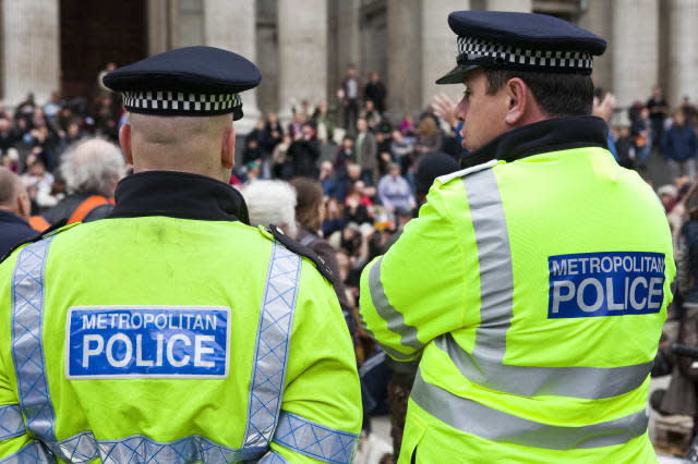 LONDON, UK - 30TH OCTOBER 2011: Two Police officers overseeing the Occupy London protest camp outside St. Paul's Cathedral in Lo