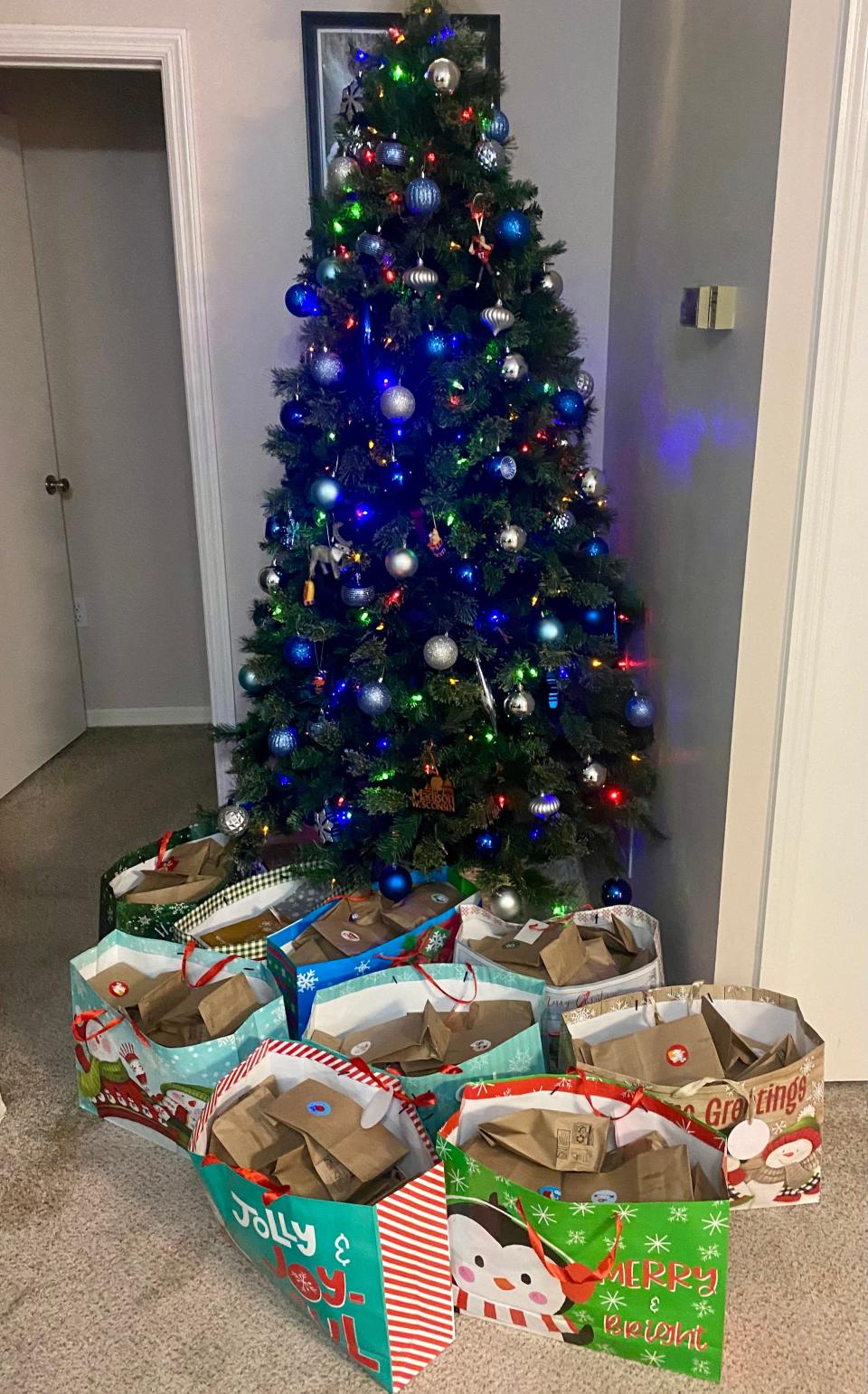 Sven Kleinhans, a University of Florida law student from Germany, makes advent calendars — a Christmas tradition from Germany — for children in hospitals. This year he made some of his calendars, each with 25 small bags, for children in Jacksonville.