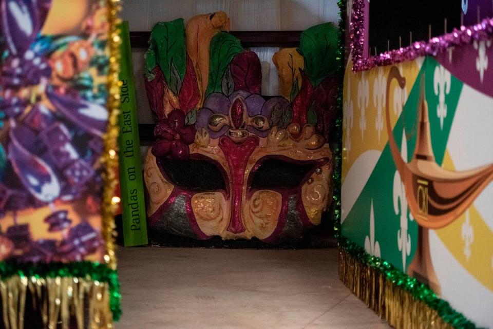 A large Mardi Gras mask in the corner at the Gulf Coast Carnival Association float den in Biloxi on Wednesday, Jan. 10, 2024. The GCCA parade rolls at 1 p.m. on Feb. 13, Fat Tuesday.