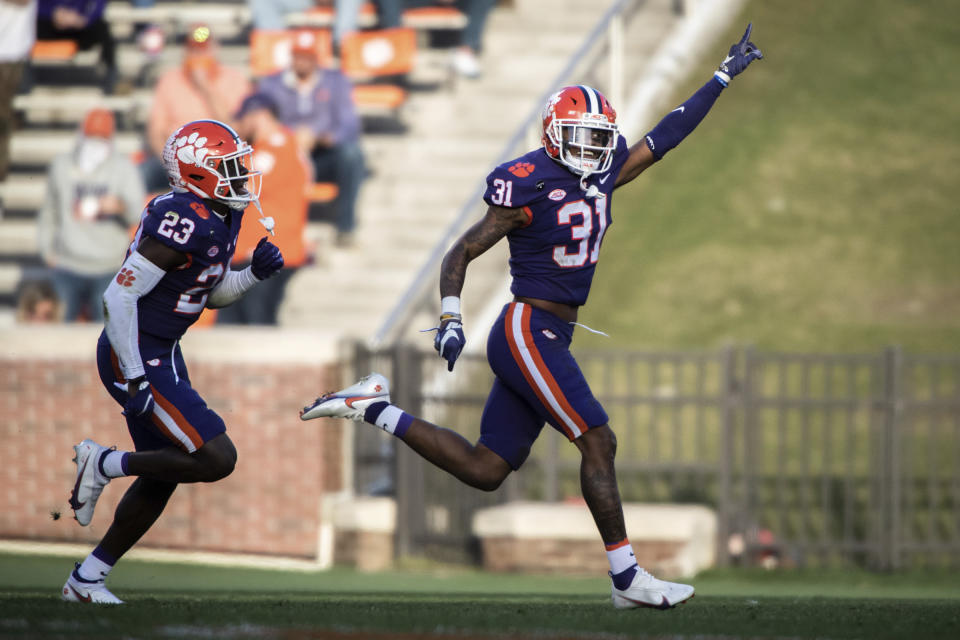 Clemson cornerback Mario Goodrich (31) celebrates after making an interception during the first half of an NCAA college football game against Pittsburgh Saturday, Nov. 28, 2020, in Clemson, S.C. (Ken Ruinard/The Independent-Mail via AP, Pool)