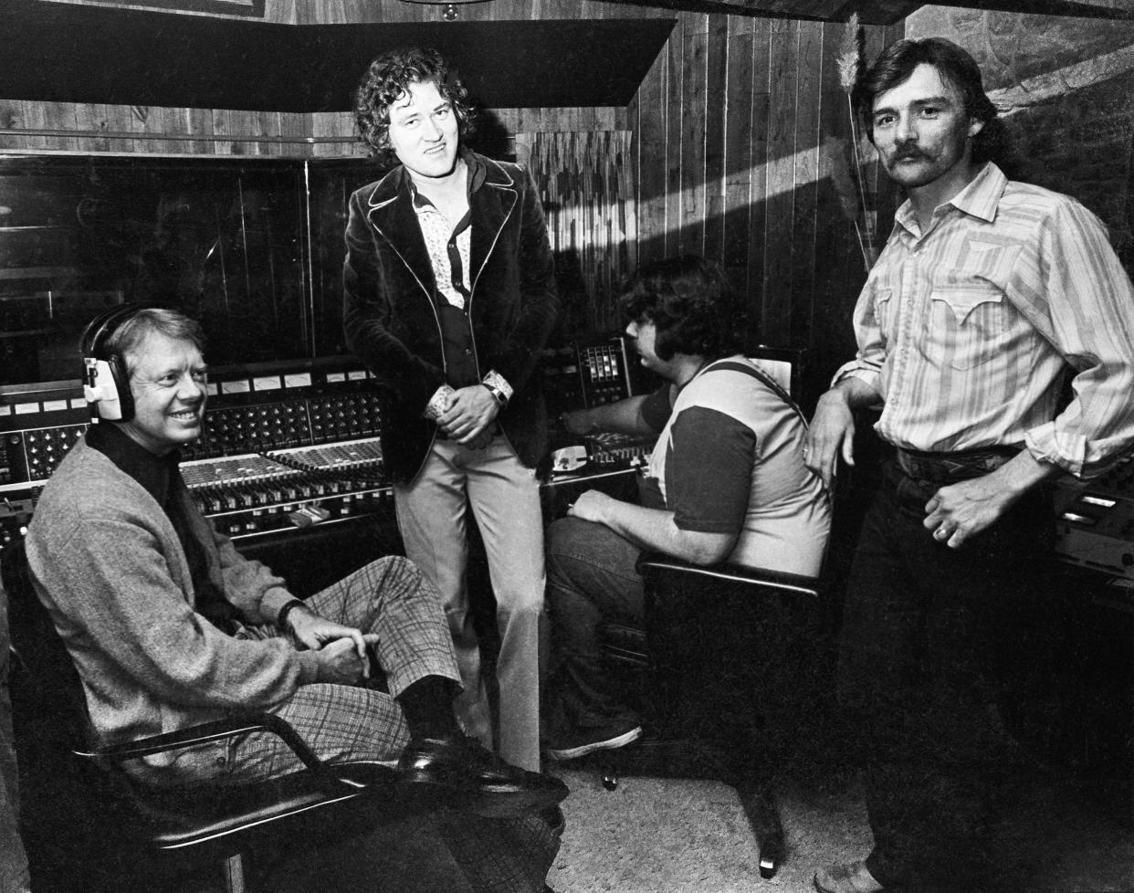 Left to right, Carter, Capricorn Records co-founder Phil Walden, producer/engineer Johnny Sandlin and Dickey Betts, 