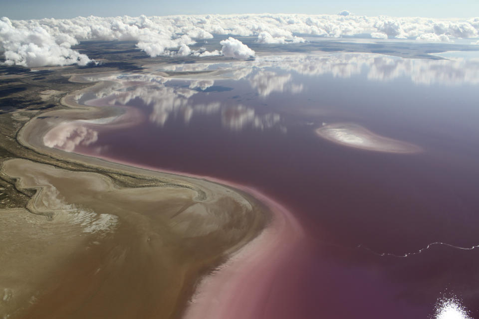 Pink water that emerges when salt and fresh water interact in Lake Eyre in Central Australia. 