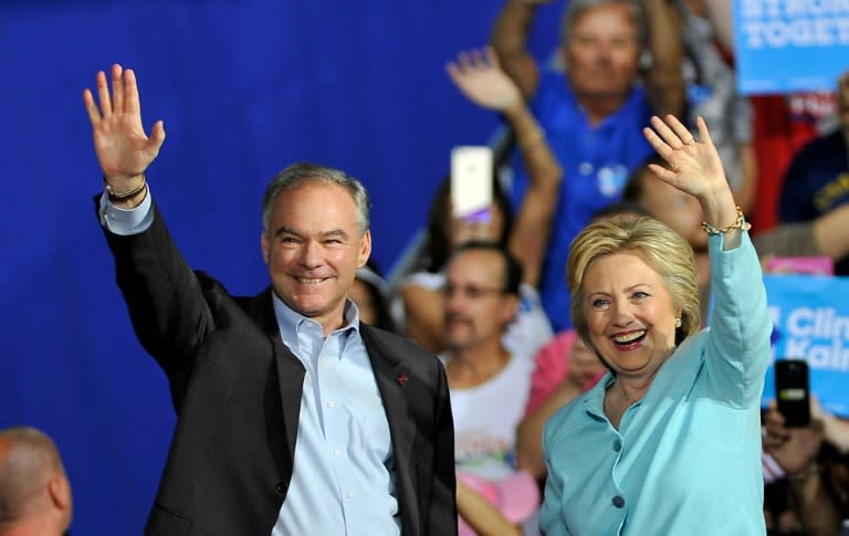 US Democratic presidential candidate Hillary Clinton and running mate Tim Kaine greet supporters at a campaign rally in Miami on July 23, 2016