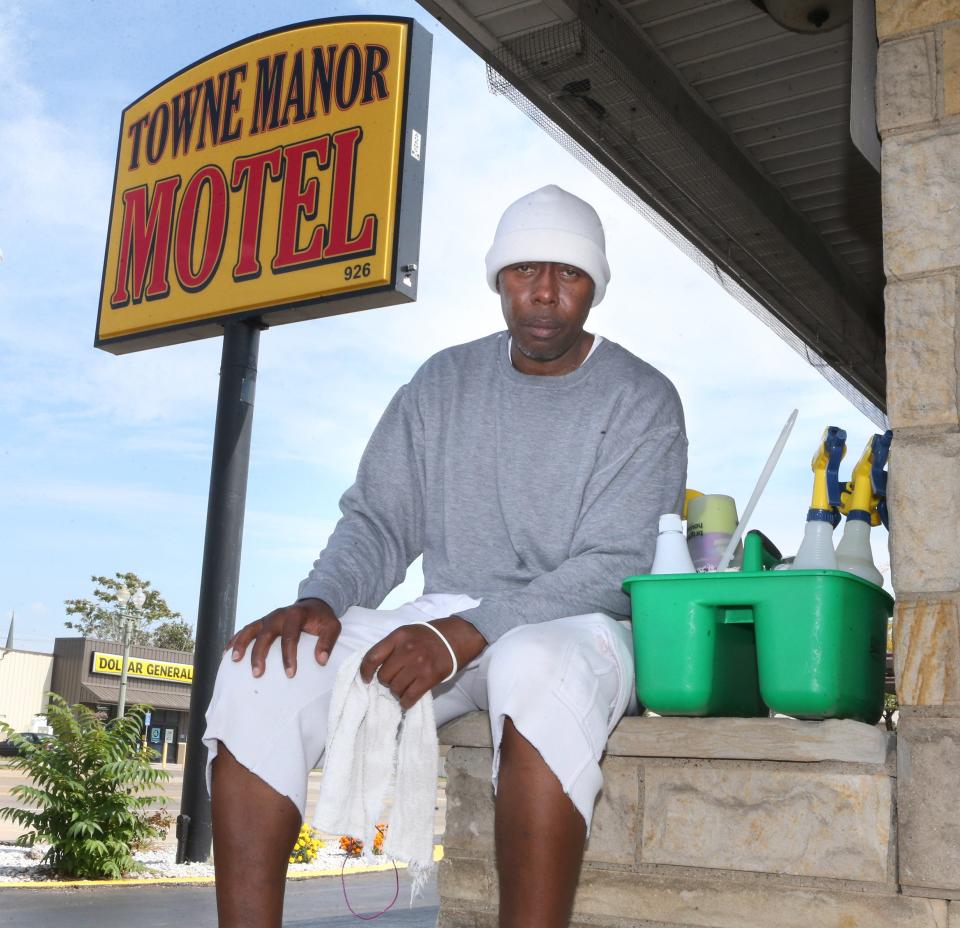 Eric Brunner is shown outside of the Towne Manor Motel in Canton where he cleans rooms in this file photo from 2021. Brunner served 13 years in prison from 1996 to 2009.