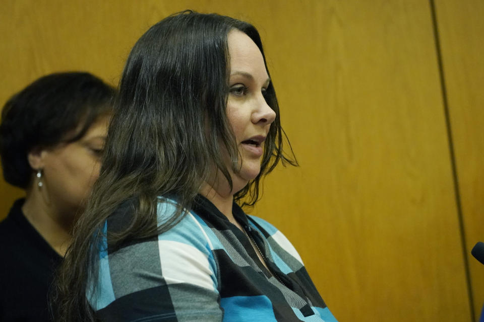 Lisa White McBlair, sister of slain Brookhaven Police Officer James White, speaks directly to her brother's admitted killer Marquis Aaron Flowers, in the Lincoln County Circuit Court, moments after he plead guilty to first degree murder in the 2018 shooting deaths of two Brookhaven police officers including White, Wednesday morning, Nov. 3, 2021, in Brookhaven, Miss. Members of the officers' families addressed the court in emotional impact statements, asking for the maximum sentences to be imposed. (AP Photo/Rogelio V. Solis)