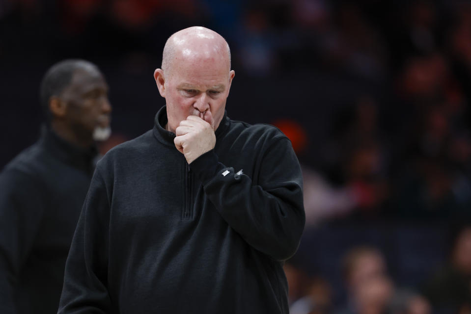 Charlotte Hornets head coach Steve Clifford stands on the court after calling a timeout as his team plays against the Toronto Raptors during the first half of an NBA basketball game in Charlotte, N.C., Wednesday, Feb. 7, 2024. (AP Photo/Nell Redmond)