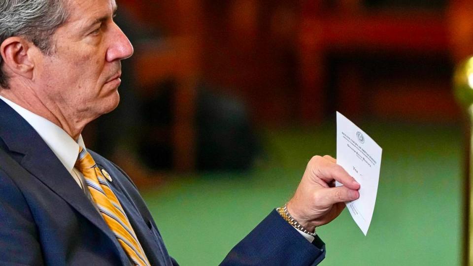 State Sen. Kelly Hancock holds a vote during the impeachment trial of Attorney General Ken Paxton at the Texas Capitol on Saturday, Sep. 16, 2023.