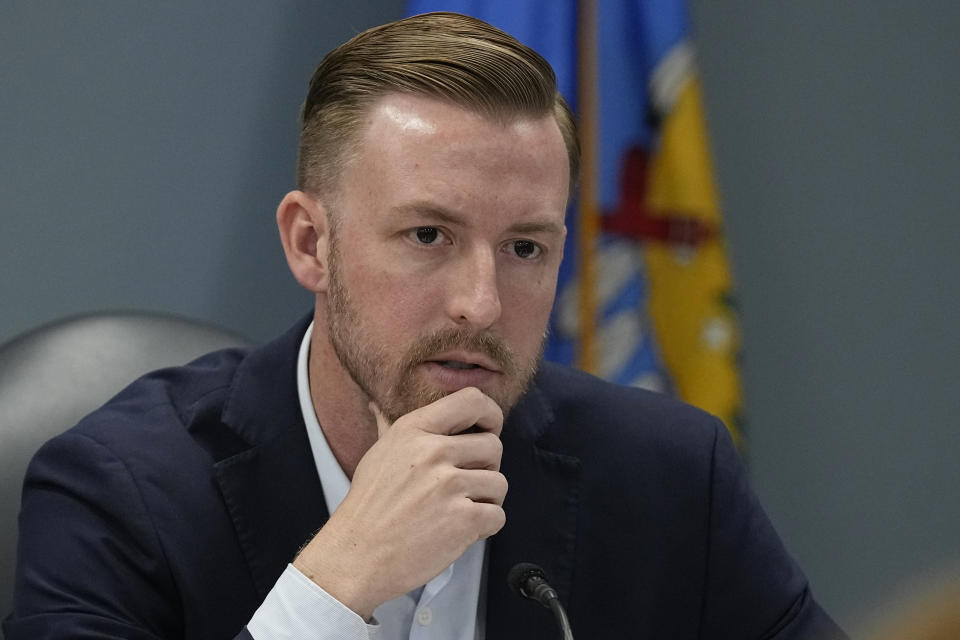 FILE - State Superintendent of Public Instruction Ryan Walters speaks during a special state Board of Education meeting discuss to the U.S. Department of Education's "Proposed Change to its Title IX Regulations on Students' Eligibility for Athletic Teams", April 12, 2023, in Oklahoma City. Walters, a former public school teacher from McAlester, has doubled down on his political rhetoric, focusing his energy on culture-war issues like targeting transgender athletes in schools, banning books and fighting what he calls “Joe Biden’s radical agenda." (AP Photo/Sue Ogrocki, File)