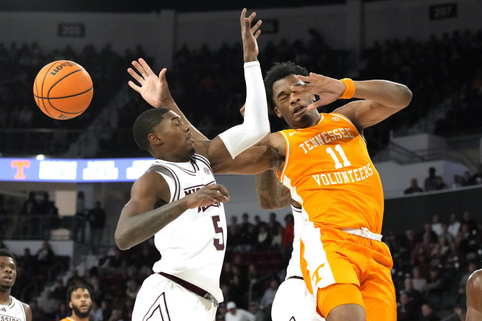 Tennessee forward Tobe Awaka (11) is fouled by Mississippi State guard Shawn Jones Jr. during the first half of an NCAA college basketball game, Wednesday, Jan. 10, 2024, in Starkville, Miss. (AP Photo/Rogelio V. Solis)