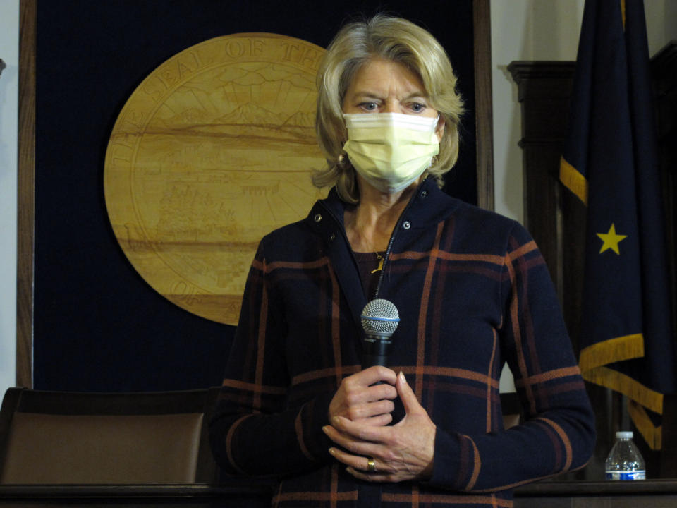 Alaska Republican U.S. Sen. Lisa Murkowski speaks to reporters during a visit to the state Capitol on Tuesday, Feb. 16, 2021, in Juneau, Alaska. Murkowski said she knows there could be political consequences for her vote to convict former President Donald Trump during his recent impeachment trial but says she can't be afraid of that. (AP Photo/Becky Bohrer)