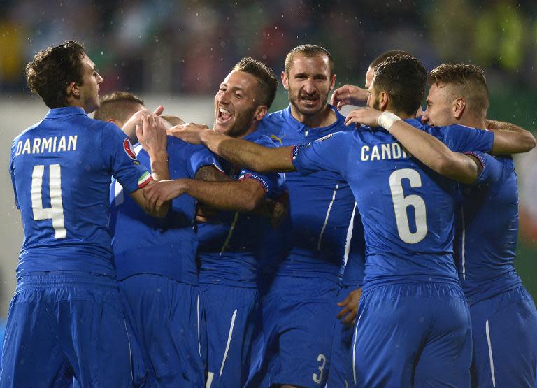 Italy's players celebrates after scoring a goal during the EURO 2016 Group H football match with Bulgaria on March 28, 2015 in Sofia, Bulgaria