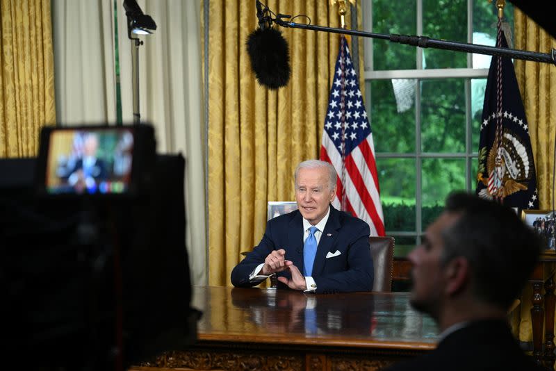 U.S. President Biden delivers a speech about bipartisan legislation that lifts federal government's $31.4 trillion debt ceiling