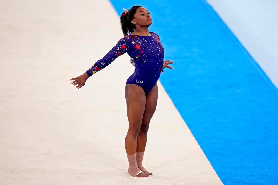 Simone Biles (USA) competes on the floor in the womens gymnastics qualifications on Sunday, July 25, 2021, during the Tokyo 2020 Olympic Summer Games at Ariake Gymnastics Centre in Tokyo, Japan.