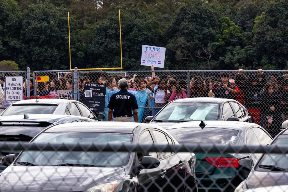 Monarch High School students conduct a walkout on Tuesday, Nov. 28, 2023 after the principal, James Cecil, and other staff members were removed from their positions pending an investigation. The reassignments occurred because a trans student had been playing volleyball at the school in Coconut Creek, Florida.