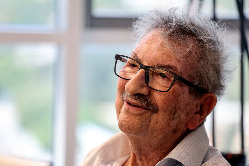 Holocaust survivor, Daniel Louz, 90, from Kibbutz Beeri, who also survived the deadly October 7 attack by the Palestinian Islamist group Hamas, looks on during an interview with Reuters in Herzliya