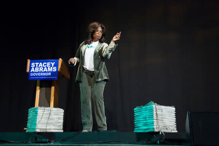 Oprah Winfrey takes part in a town hall meeting with Democratic gubernatorial candidate Stacey Abrams ahead of the mid-term election in Marietta, Georgia, U.S. November 1, 2018. REUTERS/Chris Aluka Berry