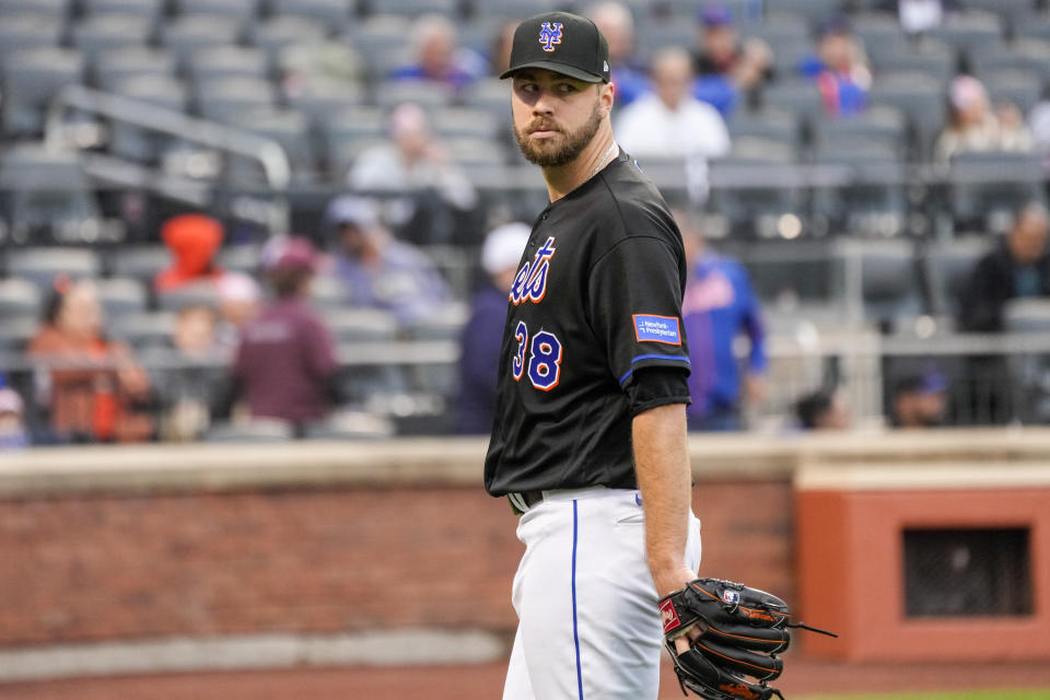 New York Mets pitcher Tylor Megill walks off the field during the seventh inning of the first game of a baseball doubleheader against the Philadelphia Phillies, Saturday, Sept. 30, 2023, in New York. (AP Photo/Mary Altaffer)