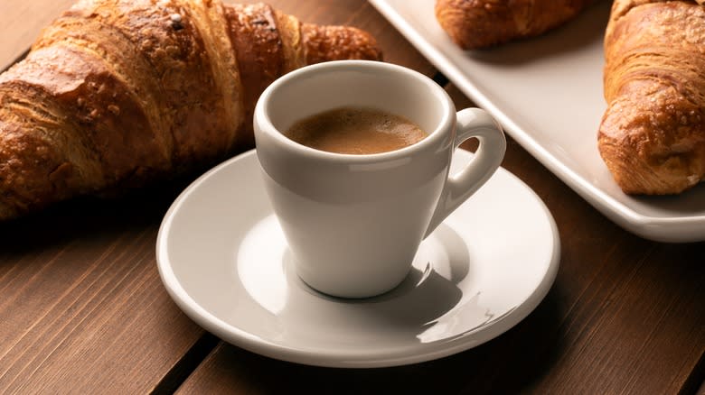 Cup of mocha with croissants