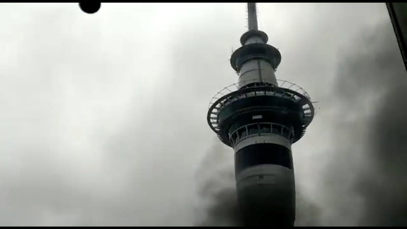 Smoke rises as a fire blazes at Sky City Convention Centre, which is under construction in Auckland