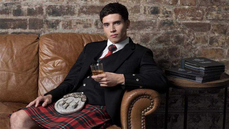 A model wearing a red MacGregor tartan kilt. - Credit: MacGregor & MacDuff