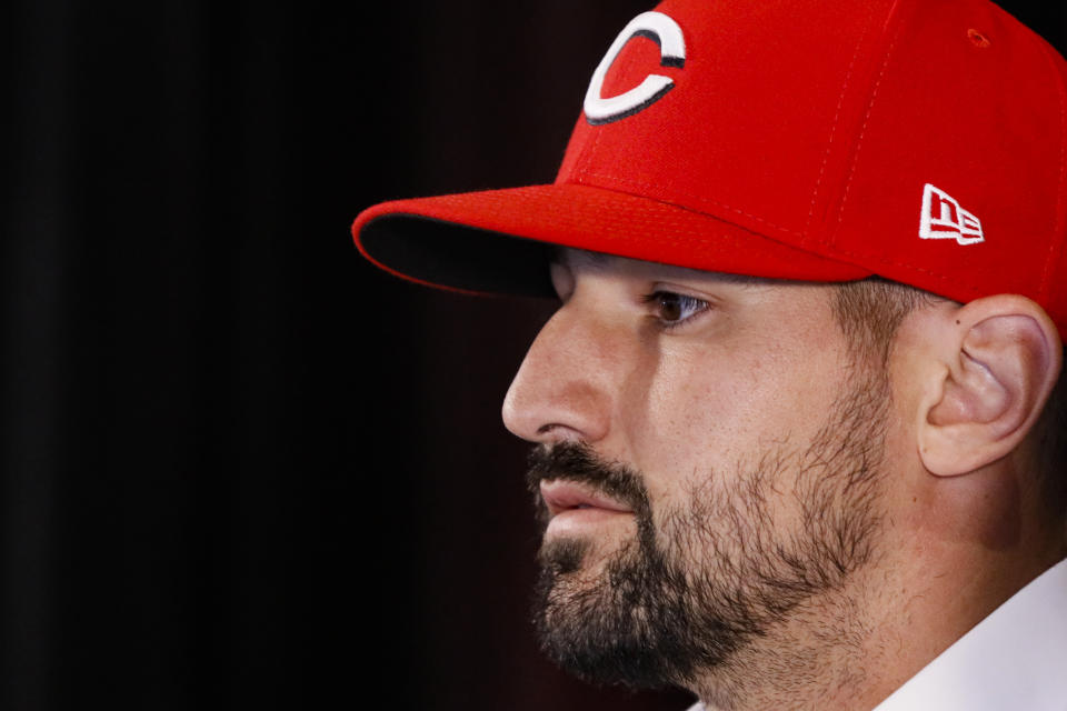 Cincinnati Reds' Nick Castellanos takes questions from reporters during a news conference, Tuesday, Jan. 28, 2020, in Cincinnati. Castellanos signed a $64 million, four-year deal with the baseball club. (AP Photo/John Minchillo)