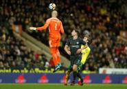 Soccer Football - FA Cup Third Round - Norwich City vs Chelsea - Carrow Road, Norwich, Britain - January 6, 2018 Chelsea's Willy Caballero heads clear of Danny Drinkwater and Norwich City's James Maddison Action Images via Reuters/John Sibley