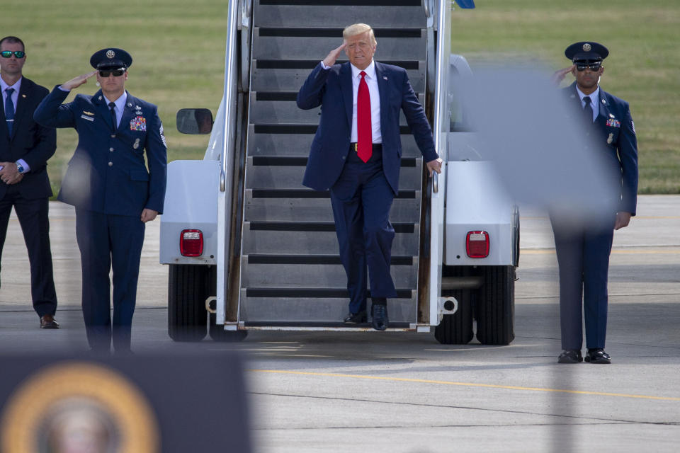 President Donald Trump arrives for an event at the Wittman Regional Airport Monday, Aug. 17, 2020, in Oshkosh, Wis. (AP Photo/Mike Roemer)