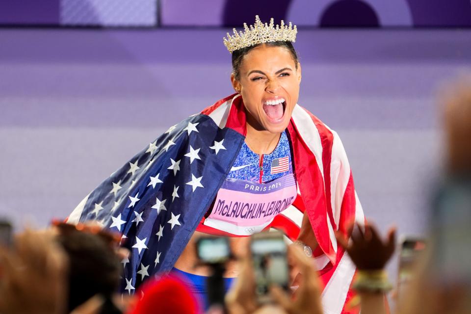 Kentucky native Sydney McLaughlin-Levrone celebrates winning the 400-meter hurdles final at the Paris 2024 Olympic Games.