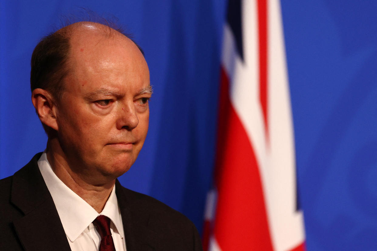 Britain's Chief Medical Officer for England Chris Whitty attends a press conference for the latest Covid-19 update in the Downing Street briefing room in central London on December 8, 2021. - The UK government is reintroducing Covid-19 restrictions due to the Omicron variant. (Photo by Adrian DENNIS / various sources / AFP) (Photo by ADRIAN DENNIS/AFP via Getty Images)