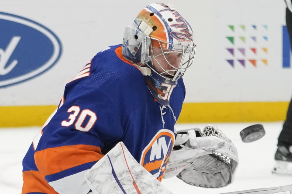 New York Islanders goaltender Ilya Sorokin makes the save during the first period of an NHL hockey game against the Dallas Stars, Sunday, Jan. 21, 2024, in Elmont, N.Y. (AP Photo/Mary Altaffer)